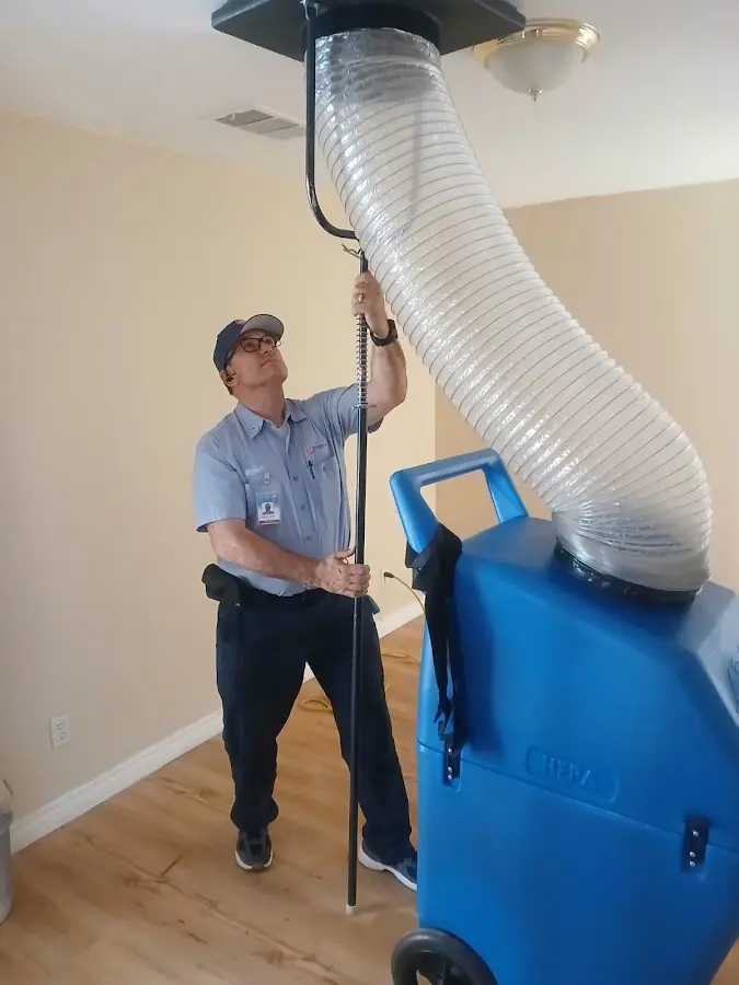 Mini Split Installation technician using HEPA equipment in Avenal